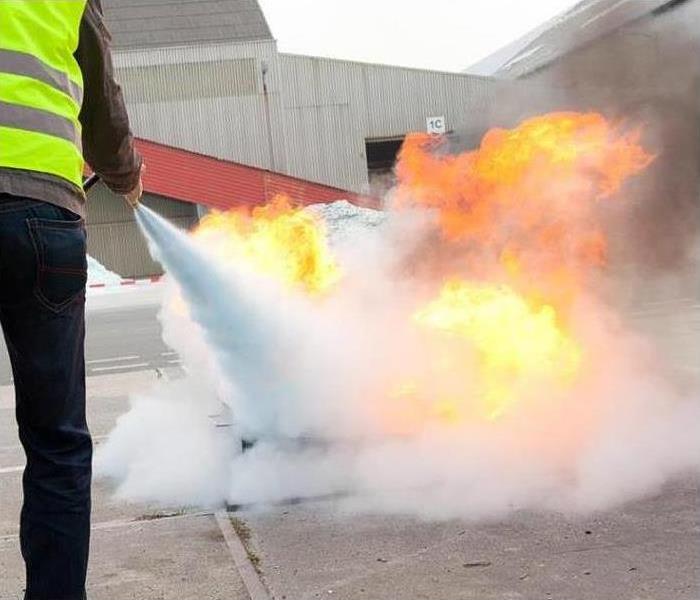 fire extinguisher exercise with a controlled burn